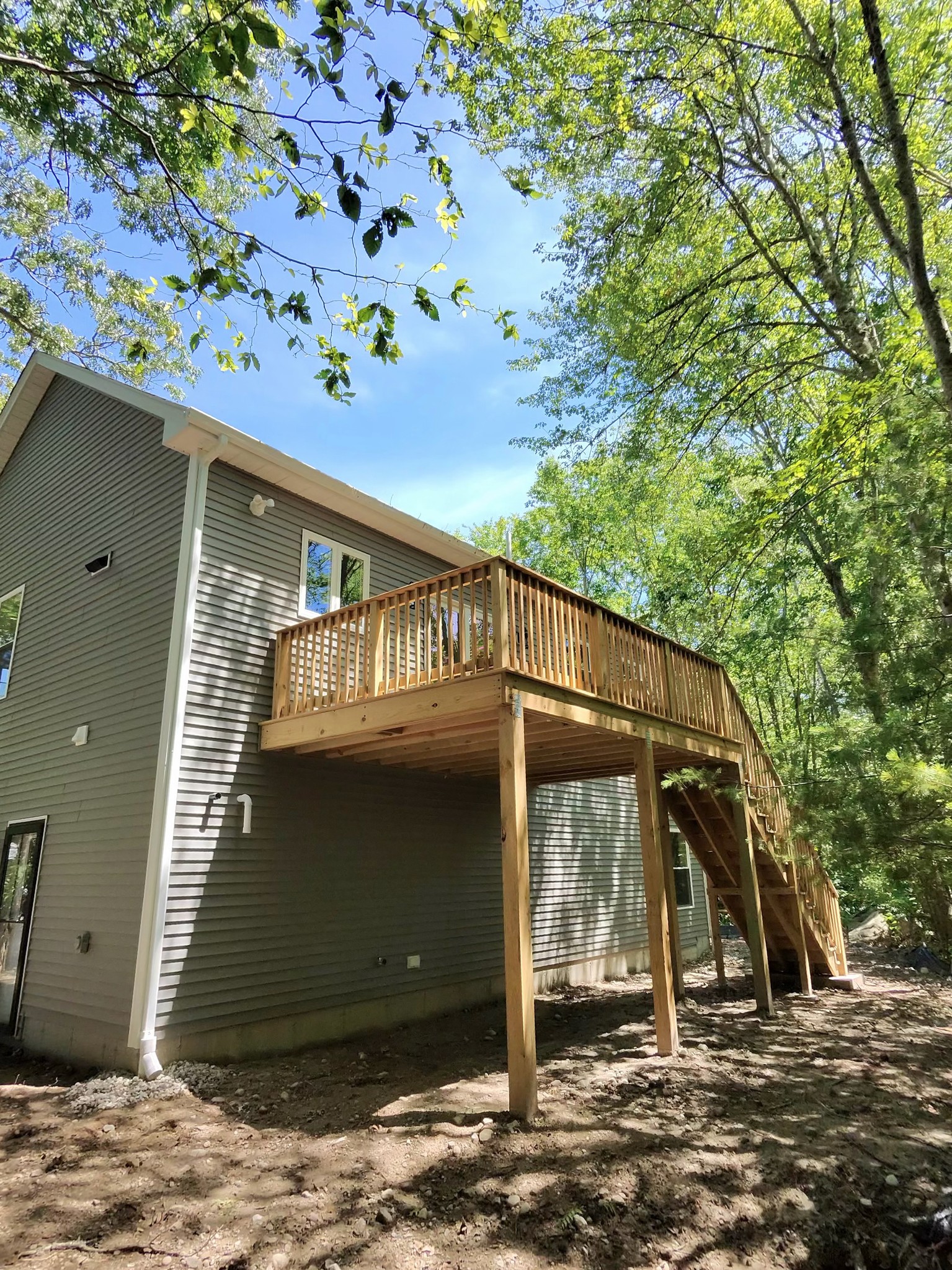 10x16 pressure-treated rear deck with stairs