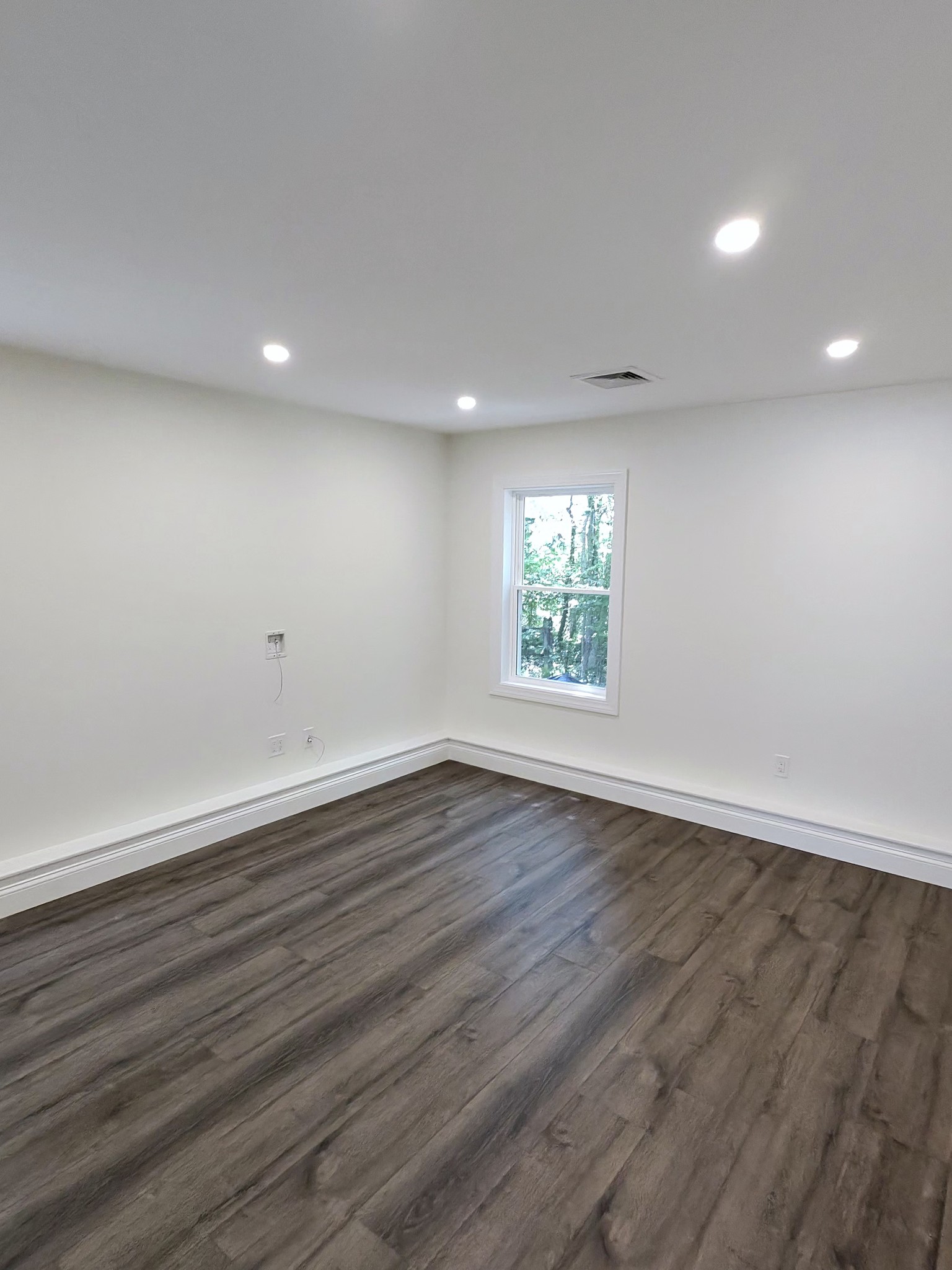 Bedroom with luxury vinyl plank flooring