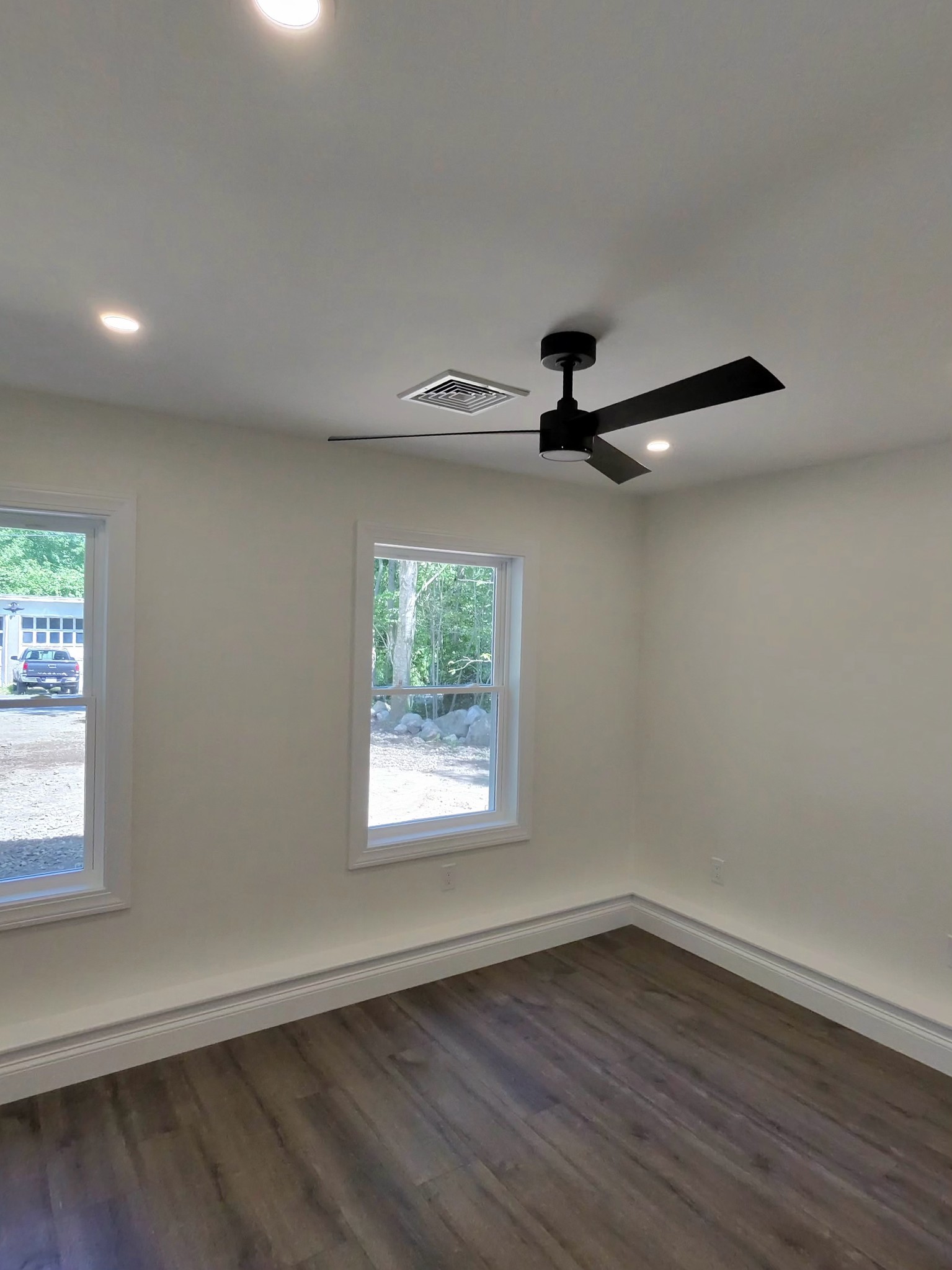 Second bedroom with ceiling fan