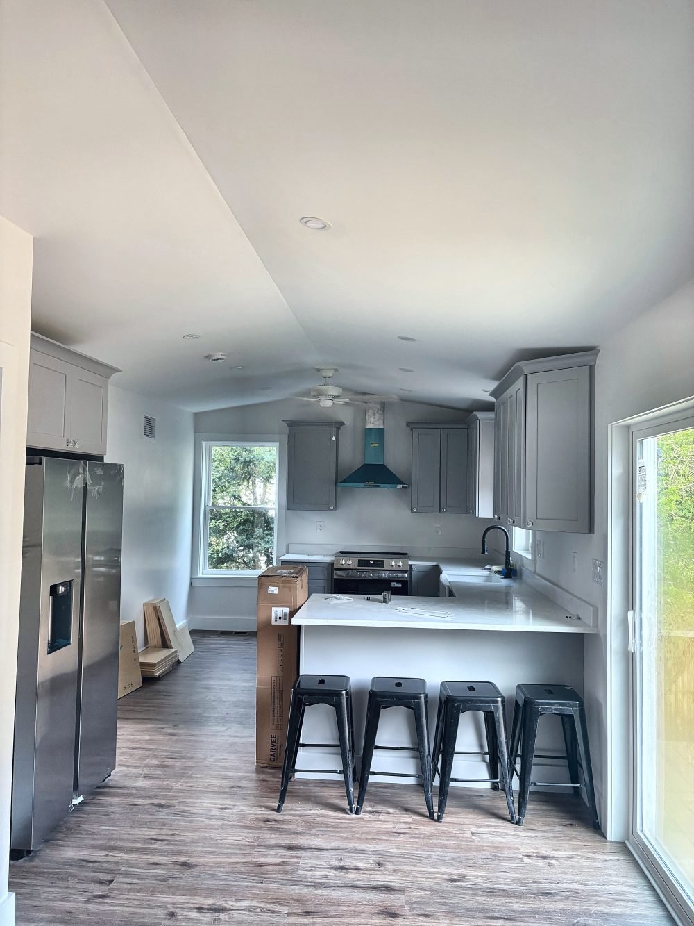 ADU kitchen and seated peninsula, open to the living area